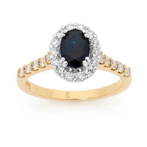 Blue Sapphire and diamond halo ring with shoulder stones in yellow gold